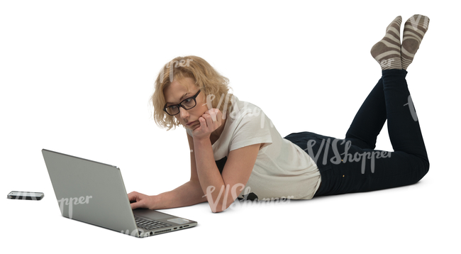 woman lying on the floor and working with her laptop