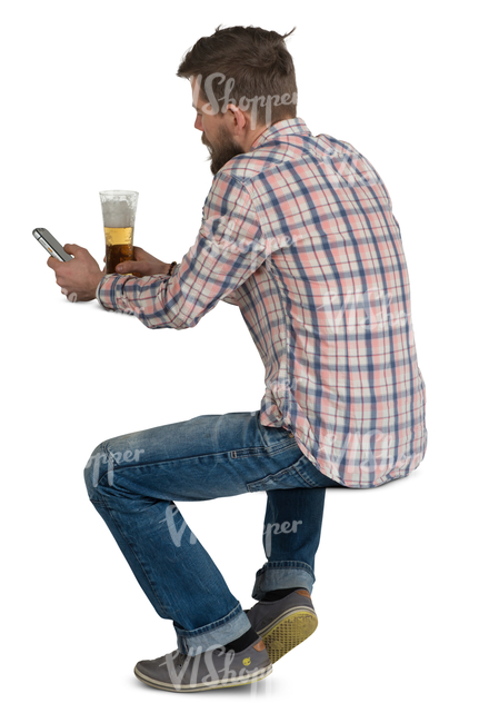 man sitting in a cafe and drinking beer