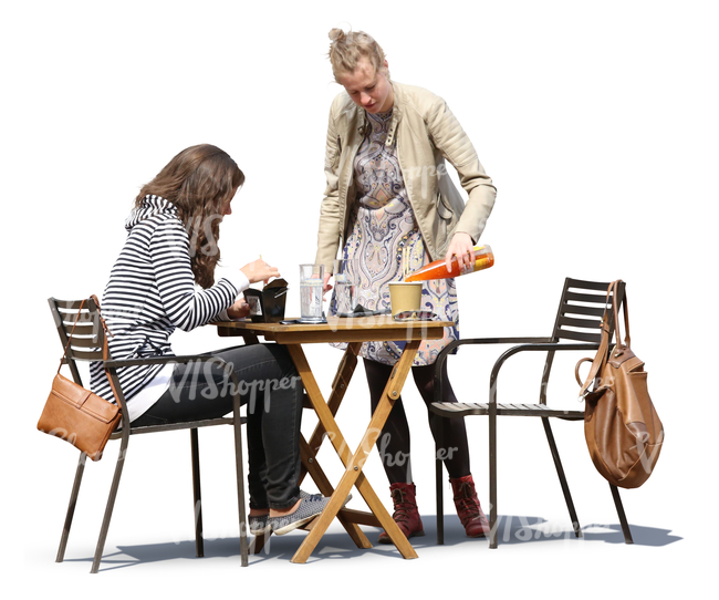 two women hanging in a cafe and eating and drinking