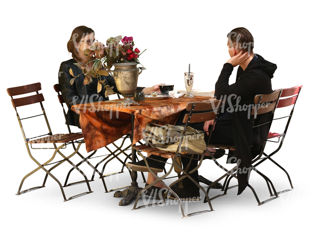 man and woman sitting in a cafe and drinking coffee