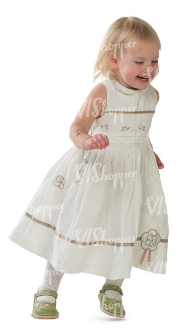 little girl in a white dress running and laughing