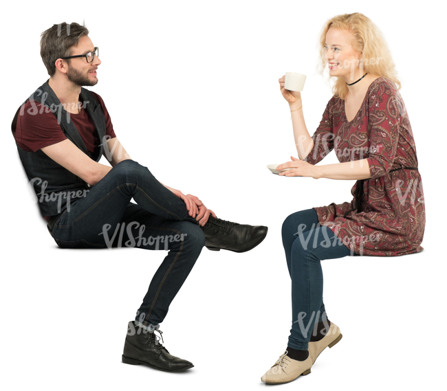 man and woman sitting in a cafe and talking