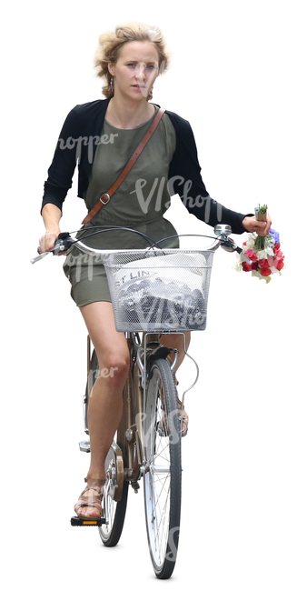 woman riding a bicycle with flowers in her hand