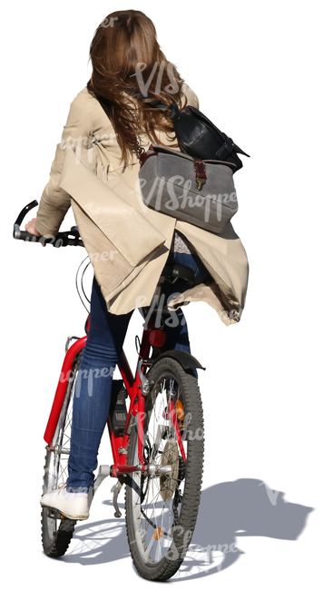 woman with long hair riding a bicycle