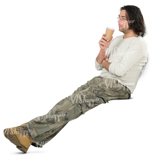 man sitting on a park bench and drinking coffee