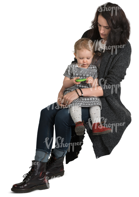 woman sitting with her daughter in her lap