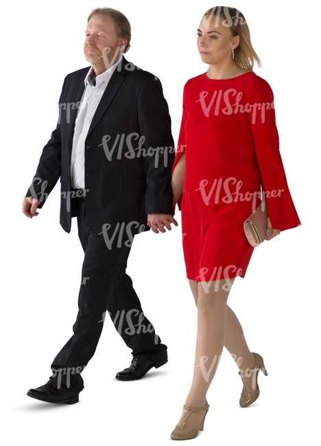 man and woman in formal clothing walking hand in hand