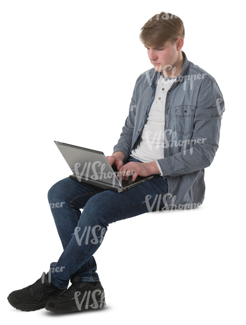 young man sitting with a laptopn on his knees