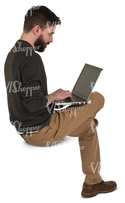 man sitting and working with a laptop