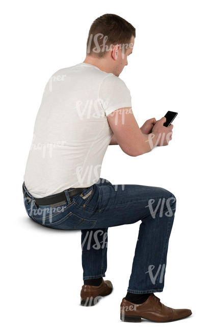 man sitting at the desk and texting