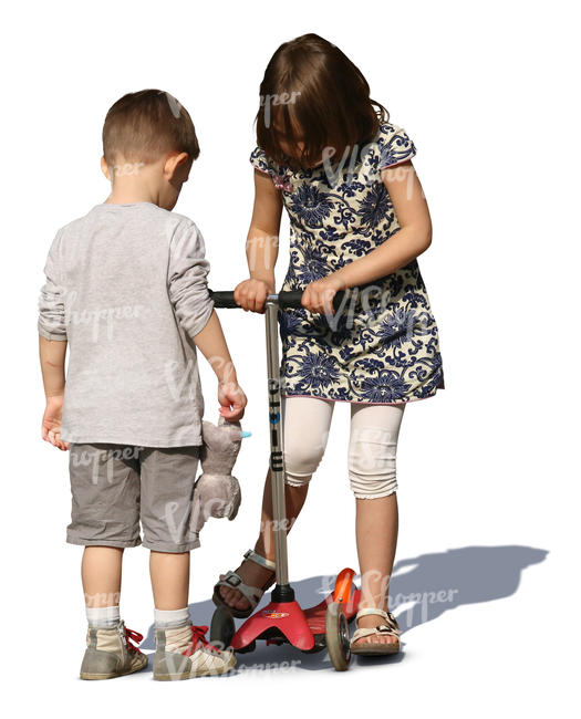 boy and girl playing together with a scooter