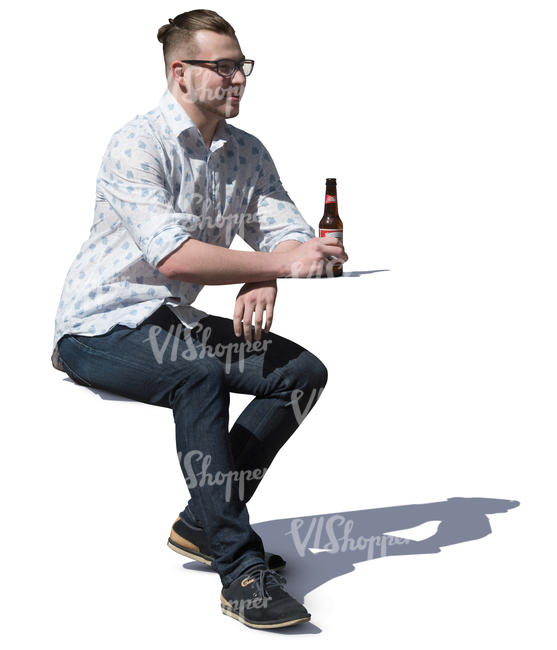 man sitting in a cafe and drinking beer