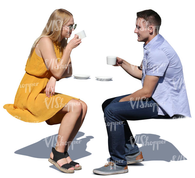 couple sitting in a cafe and drinking coffee