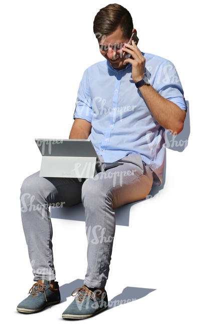 man sitting on a bench and working with laptop