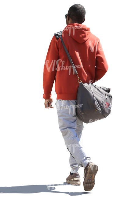 black man in a red jacket walking on the street