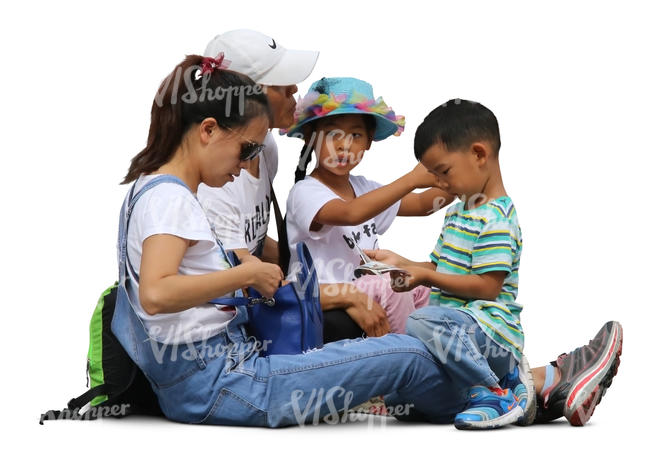 asian family of four sitting together