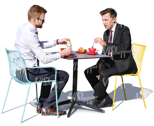 two businessmen having a lunch in a cafe