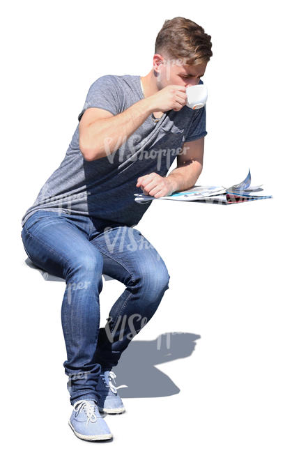 man sitting in a cafe and drinking coffee.