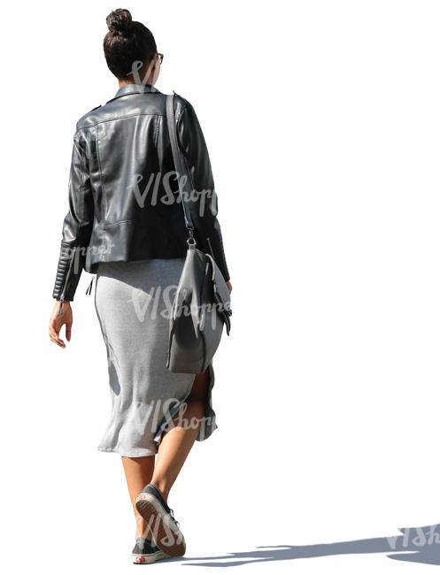 woman in a leather jacket walking
