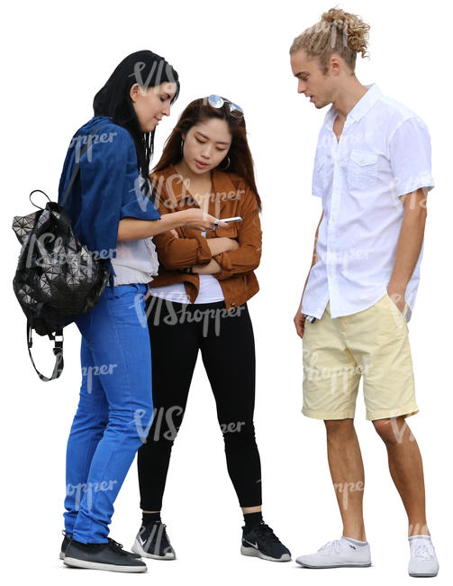 group of three people standing and looking at smth on the phone