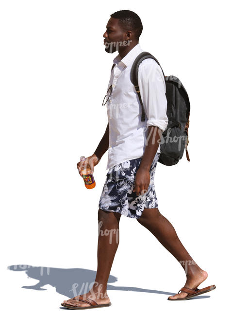 black man with a backpack walking