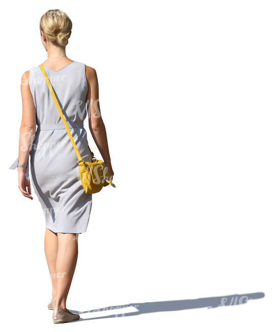 woman in a grey summer dress walking