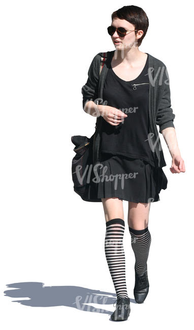 cut out woman in a black outfit walking