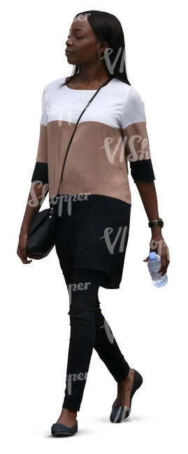 black woman in a dress walking