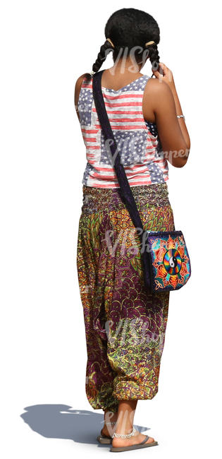 black woman in colorful resort clothes standing