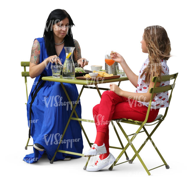 woman sitting in a cafe with her teenage daughter