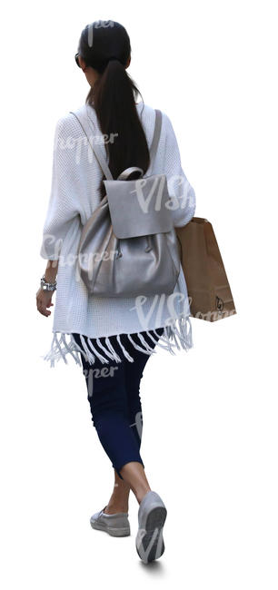 woman with a shopping bag walking