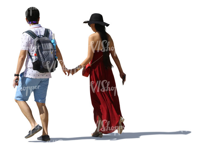 asian couple walking hand in hand in summertime