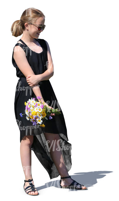 teenage girl with a bouquet of flowers standing