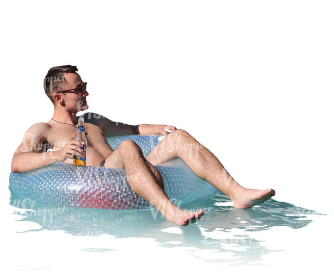 man floating with a swimming ring in a pool