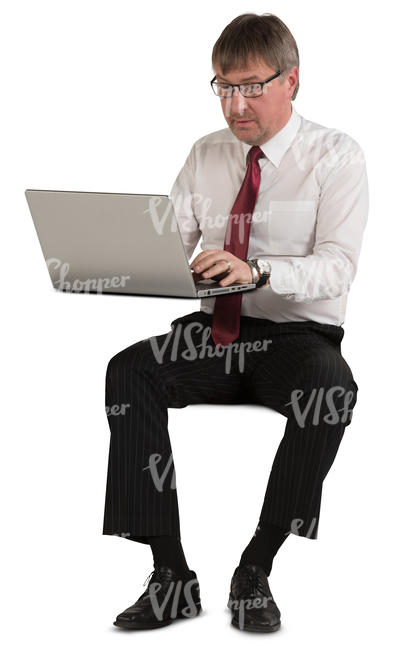 businessman sitting and working with laptop