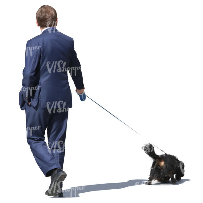 businessman walking a dog
