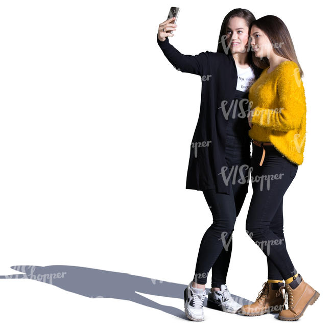 two teenage girls taking a selfie