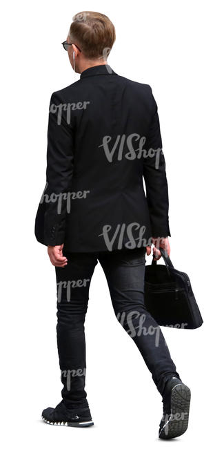 young businessman with a laptop bag walking