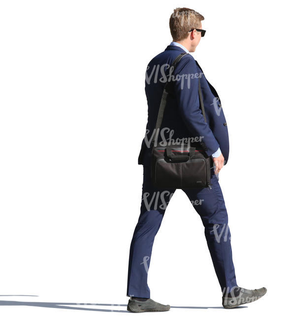 businessman in a blue suit walking