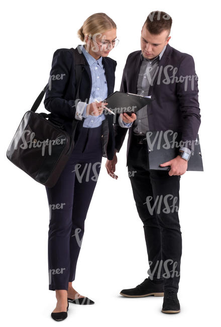 businessman and businesswoman standing and looking at papers
