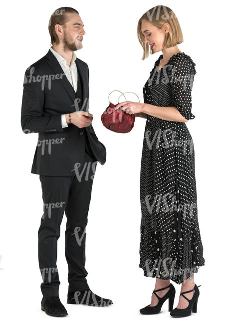 man and woman in formal wear standing and talking