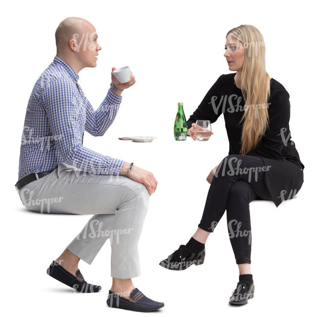 couple sitting in a cafe sitting and talking