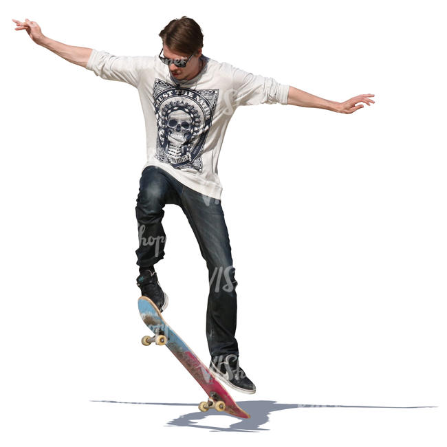 young man performing a stunt on his skateboard