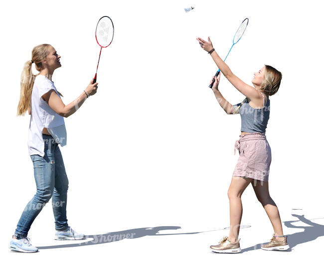 two women playing badminton