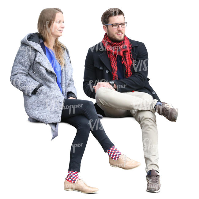 man and woman sitting outside and talking