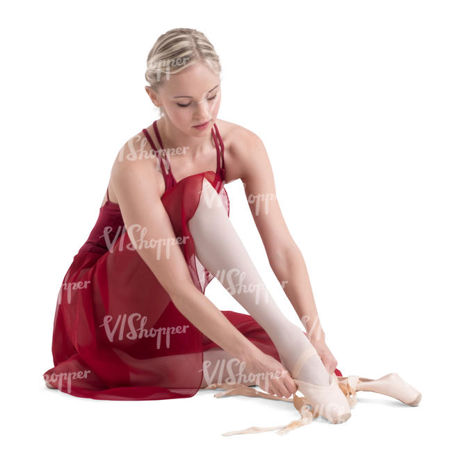 ballerina tying her shoe laces