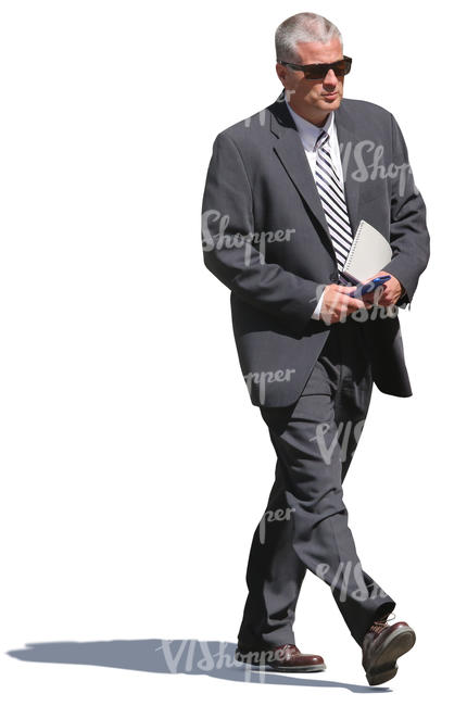 businessman with a striped tie walking