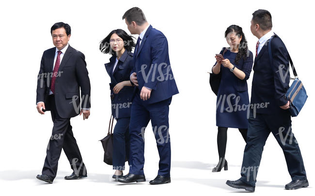 group of asian businessmen and businesswomen walking