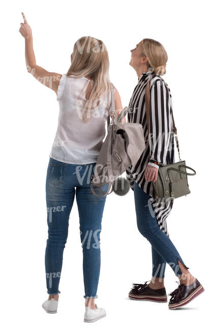 two women standing and pointing at smth