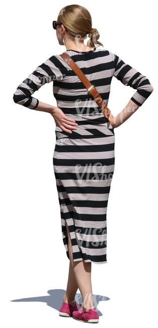 woman in a striped dress standing
